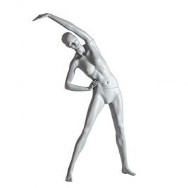 Female window mannequin stretching yoga